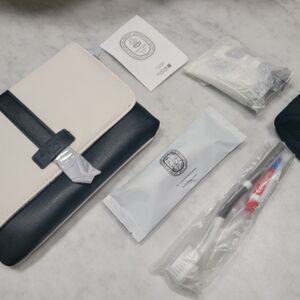 diptyque Paris makeup bag from Qatar Airlines with kit